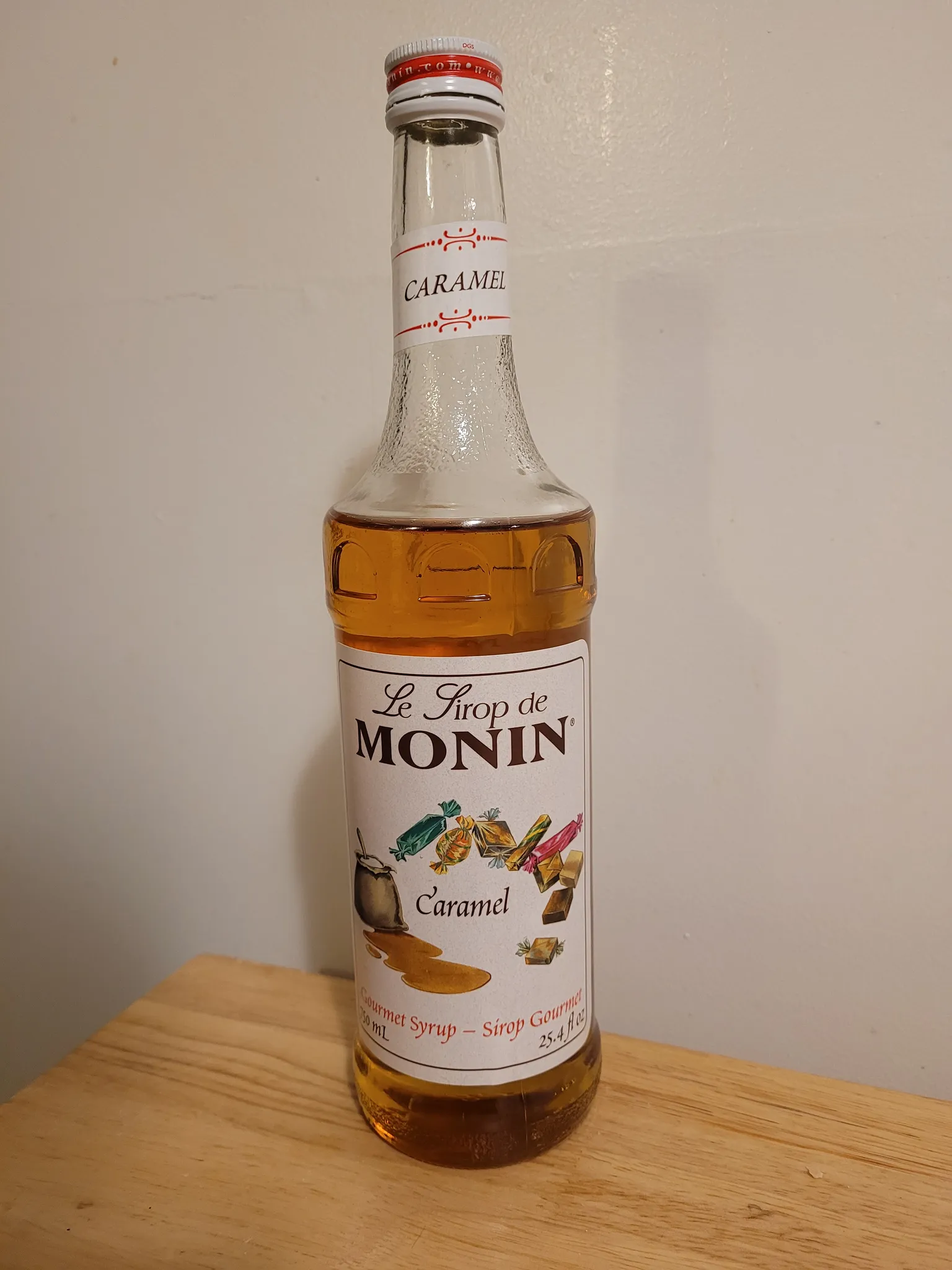 Opened caramel syrup  photo 1