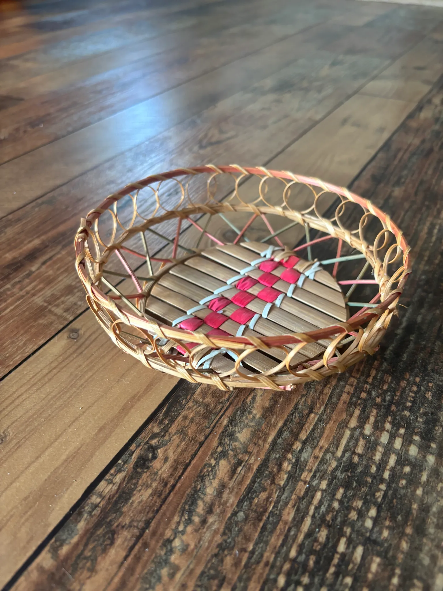 Handcrafted Woven Basket with Red Accents photo 1