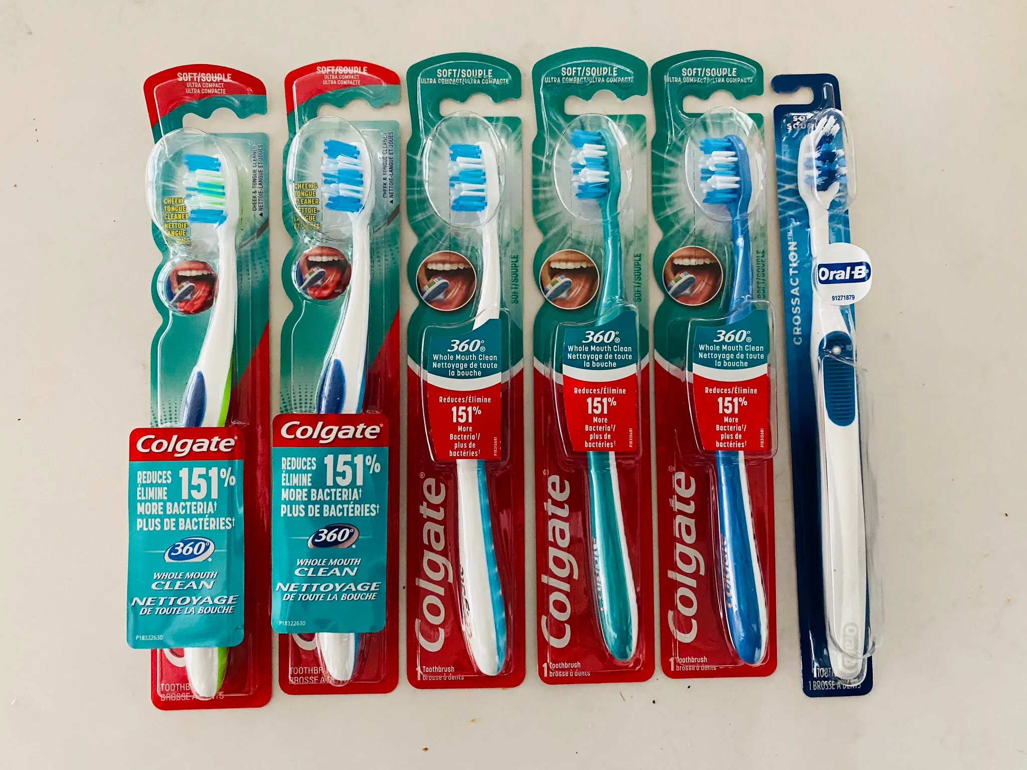 Brand new, sealed in package Colgate and Oral B toothbrushes photo 1
