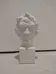 White ceramic bust photo 1