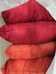 2 red 2 orange pillows photo 1