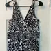 BEBE JUMPSUIT SIZE LARGE photo 2