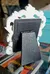 Small white photo frame.  Ornate design.  Holds a small photo.   photo 3