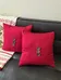 2 red 2 orange pillows photo 3