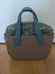 Brand New Unique Justo Handbag with Embellished Inner Pouch photo 1
