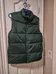 Green puffer vest photo 1