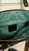 Coach canvas bag in black exterior and teal interior photo 2